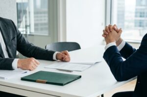 people negotiating at meeting table 202606171643